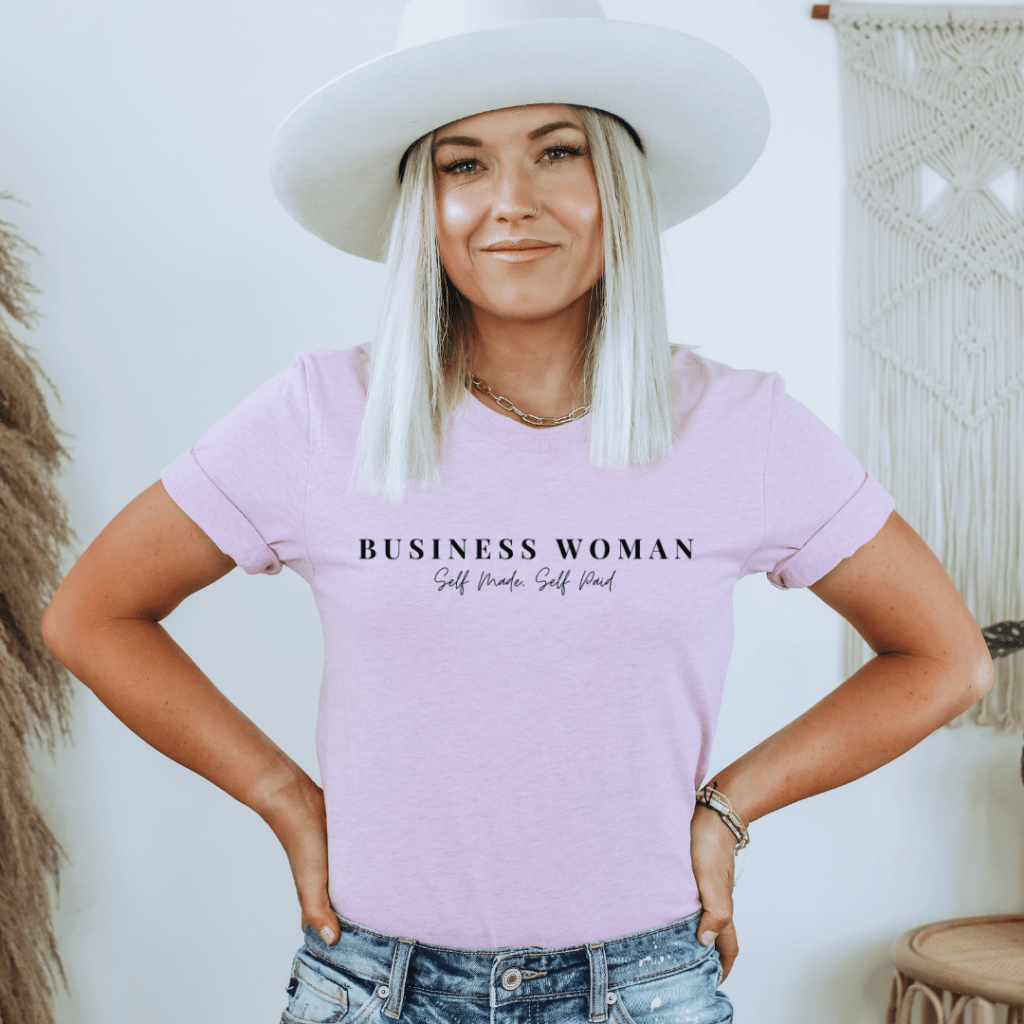 female entrepreneur wearing a business woman shirt in heather prism lilac, Shop Empowher House Merch